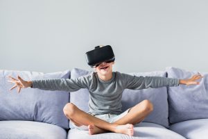 boy playing with VR